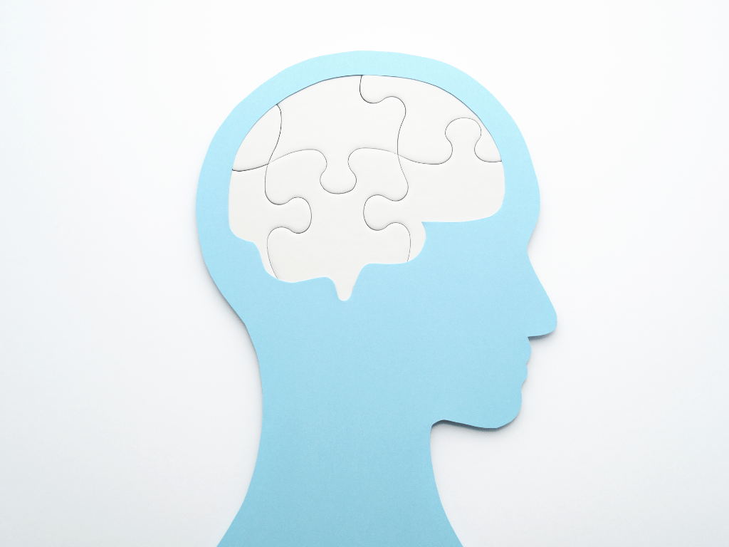 Symbolbild Kopf mit Puzzle – EFT Coaching bringt innere Klarheit, Balance und emotionale Freiheit